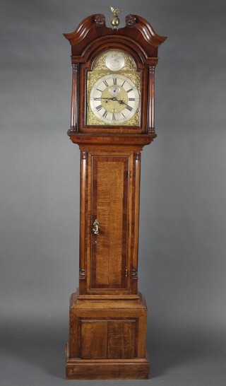 Fugo, Fuge Salmon + Whitchch Fecit, (as marked on the dial)  an 18th Century longcase clock striking on bell, the 30cm arched gilt dial with bird and silvered chapter ring, minute indicator and calendar aperture, contained in a crossbanded oak case 213cm h, complete with pendulum, key and weights 