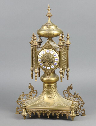 A handsome French 19th Century 8 day striking on bell mantel clock contained in a shaped gilt metal case surmounted by a lidded urn, raised on a shaped foot cast birds, the dial with oval blue and white porcelain Roman numeral panels, the back plate marked P L T H E 337, complete with pendulum but no key 