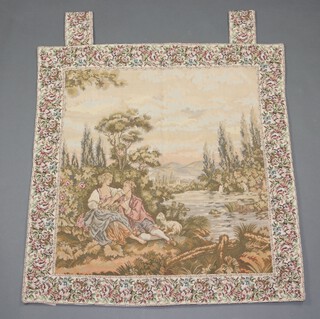 A machine made tapestry panel depicting a seated couple by mountain lake 81cm x 79cm 