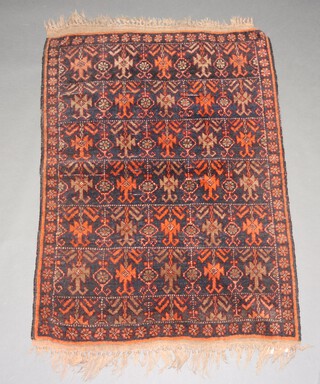 A black, brown and orange ground Afghan rug with all over geometric design 119cm x 86cm 