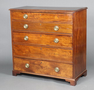 A Georgian mahogany secretaire chest, the secretaire drawer fitted with pigeon holes, drawers and cupboard, above 3 long drawers 109cm h x 110cm w x 53cm d 