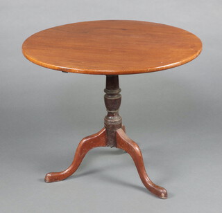 A 19th Century circular snap top tea table raised on turned column and tripod base 71cm h x 83cm diam. 