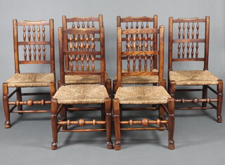 A harlequin set of 6 elm spindle back dining chairs with woven rush seats 97cm h x 51cm w x 42cm d (seats 24cm x 20cm) 