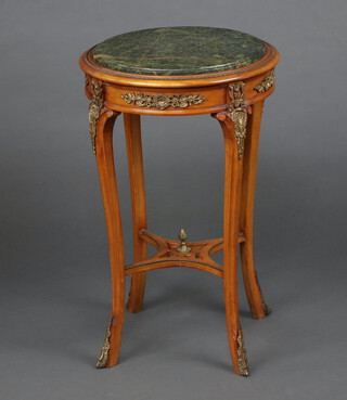 A circular Empire style bleached mahogany occasional table with green veined marble top and gilt metal mounts, shaped stretcher surmounted by a gilt metal urn 74cm h x 47cm diam. 