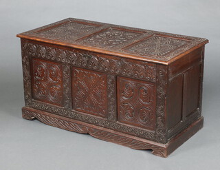 An 18th Century carved oak coffer of panelled construction with later Victorian carved oak panels and hinged lid 66cm h x 121cm w x 59cm d 