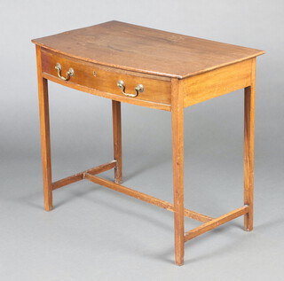 A 19th Century mahogany bow front side table fitted 1 long drawer, raised on square tapered supports with H framed stretcher 66cm h x 72cm w x 47cm d 
