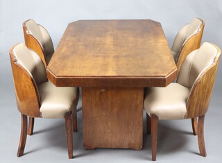 In the manner of Epstein, an Art Deco "cloud" walnut dining suite in the manner of Epstein comprising lozenge shaped 3/4 galleried dining table, raised on squared  column supports 76cm h x 163cm l x 92cm w, together with a set of 4 cloud back dining chairs upholstered in light brown leather raised on square tapered supports 83cm h x 51cm w x 43cm d (seats 25cm x 29cm) 