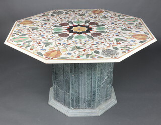 A 20th Century octagonal Indian inlaid specimen marble pedestal table, raised on a carved hard stone pedestal base 79cm h x 137cm w x 137cm d 