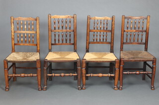 A harlequin set of 4 18th/19th Century elm spindle back dining chairs with woven rush seats 92cm h x 46cm w x 39cm d  