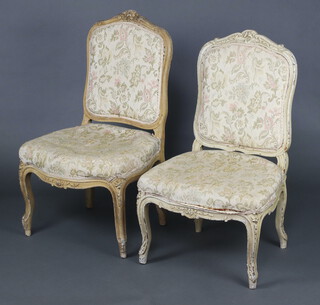 A pair of 19th Century  French salon chairs with  upholstered backs and seats of serpentine outline, raised on cabriole supports 93cm h x 56cm w x 43cm d (seats 32cm x 30cm) 