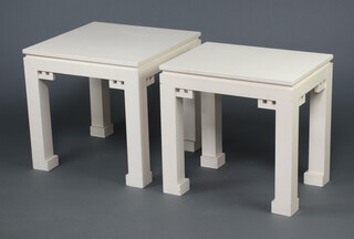 Two similar white painted rectangular lamp tables 