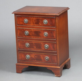 A Georgian style crossbanded mahogany chest of 4 drawers, raised on bracket feet 63cm h x 49cm w x 32cm d 