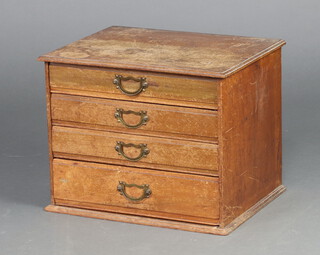 An Edwardian mahogany 4 drawer table top display cabinet 35cm h x 45cm w x 34cm d (sun bleached, contact marks in places) 