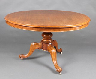 A Victorian circular mahogany Loo table raised on pillar and tripod base 71cm h x 120cm diam. (ring and contact marks, slight warp and split, the base has an old repair to 1 leg) 