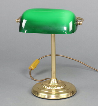 A reproduction Victorian gilt metal bank light with green glass shade 30cm h x 27cm w x 16cm 