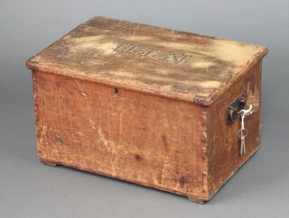 A 19th Century rectangular pine trunk, the lid with stud work initials H J N, fitted interior and iron drop handles to the sides 31cm h x 55cm w x 36cm d  