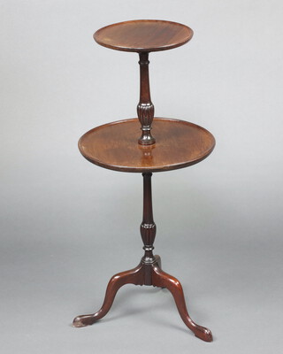 A Georgian style circular 2 tier mahogany dumb waiter raised on pillar and tripod base 84cm h x 38cm diam. 