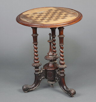 A Victorian circular inlaid mahogany table, the top inlaid a chessboard, raised on 3 spiral turned columns with scrolled feet 71cm h x 68cm diam.