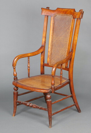 A 19th Century mahogany stick back open arm chair with woven cane panels to the back and seat, raised on turned supports 101cm h x 50cm w x 47cm d (seat 29cm x 27cm)