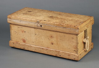 A 19th Century  rectangular pine trunk with hinged lid and rope handles, raised on a platform base 40cm h x 90cm w x 40cm d 