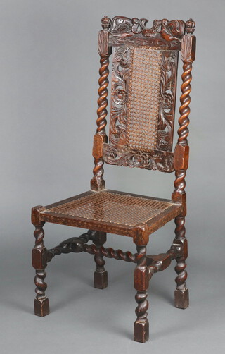 A Charles II carved walnut and cane chair atop pierced foliate cresting rail with central Boyes and Crownes, rectangular cane back panel with pierced foliate and carved flowers supported by spiral turned uprights above cane seat 114cm h x 50cm w x 39cm d 