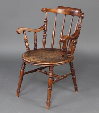 A 19th Century  beech stick and rail back Windsor carver chair raised on turned supports with H framed stretcher 87cm h x 62cm w x 51cm d (seat 27cm x 40cm) 