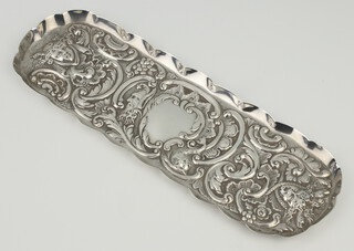 A Victorian repousse silver rounded rectangular pin tray, London 1896, 21cm, 74 grams 