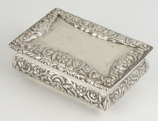 A Victorian rectangular silver table top snuff box decorated with flowers and vacant cartouche London Birmingham 1839 by Joseph Wilmore 9cm, 243.3 grams 
