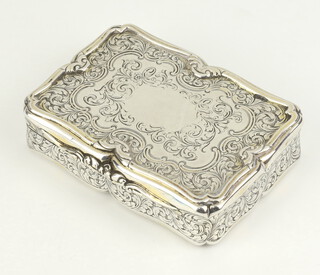 A Victorian silver rounded rectangular table snuff box with scroll decoration and vacant cartouche, Birmingham 1848, by Nathaniel Mills, 9cm 172.3 grams 