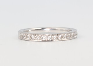 A white metal plat. diamond half eternity ring approx. 0.15ct, 3.4 grams, size K 1/2