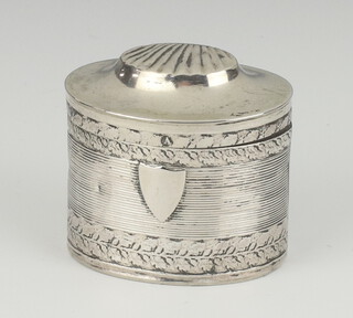 A 19th Century Dutch oval silver cashew box with shell decoration and vacant cartouche 4cm, 18.7 grams 