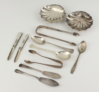 Two repousse silver butter dishes Sheffield 1906, 2 butter knives, 2 pairs of sugar nips, 3 spoons and 2 fruit knives, 208 grams 