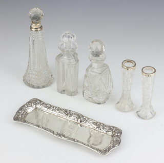 An Edwardian silver mounted scent bottle 18cm, rubbed marks, 2 ditto vases and 2 glass scents together with a silver pin tray Birmingham 1906 20cm 