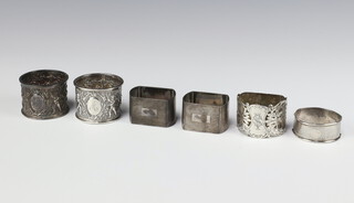 A pair of Victorian repousse silver napkin rings Birmingham 1898, 4 others, 141 grams 