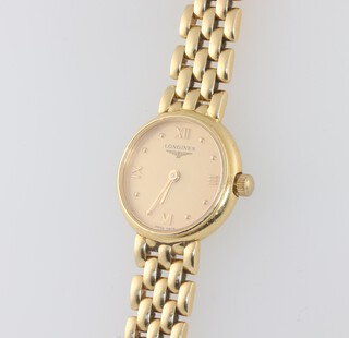 A lady's Longines 18ct yellow gold quartz wristwatch, case numbered 30455587 18mm, on an 18ct yellow gold bracelet, gross weight including movement 29.6 grams 