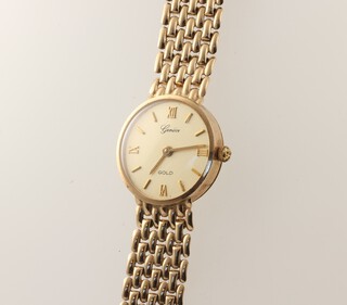 A lady's 9ct yellow gold Geneve quartz wristwatch on a ditto bracelet, gross weight 15.9 grams 