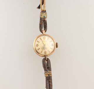 A lady's 9ct yellow gold Rolex wristwatch, the case numbered 8831 18mm 