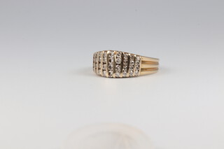 A yellow metal 585 diamond set 4 row ring, 3.6 grams, size M 1/2