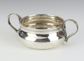 A sliver 2 handled porringer of plain form, Chester 1918, 167 grams, 16cm 