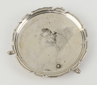 A Georgian style silver card tray with engraved armorial on pad feet, London 1926, 119 grams, 14cm 