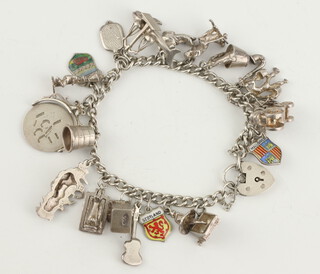 A silver charm bracelet 58 grams 