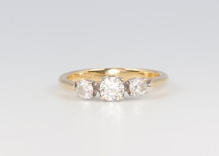 An 18ct yellow gold 3 stone diamond ring, approx 0.5ct, 2.4 grams, size I 