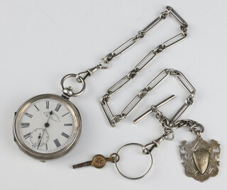 A gentleman's 935 key wind pocket watch with seconds at 6 o'clock  on a silver Albert with fob 