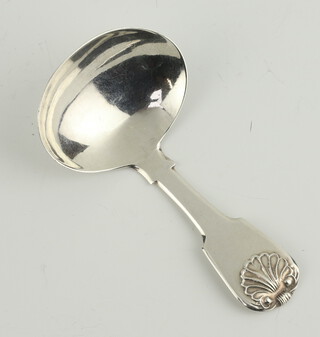 A George III caddy spoon with shell handle London 1816, maker James Wintle 11.1 grams 