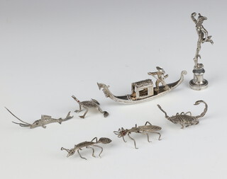 A 925 standard model of a gondola, 5 white metal animals and a desk seal l