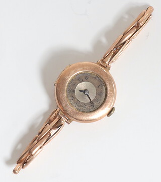 A 9ct yellow gold lady's wristwatch on an expanding bracelet, gross weight including movement 16.4 grams 