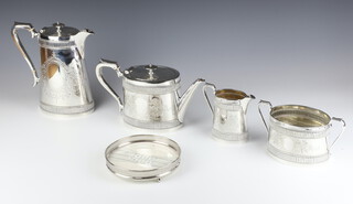 An Edwardian silver plated 4 piece tea and coffee set with kettle stand