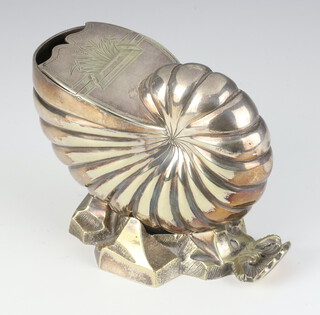 A Victorian silver plated spoon warmer in the shape of a shell 13cm 
