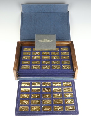A cased proof set of 100 Jane's Medallic Register of The World's Great Aircraft, gilt on bronze 