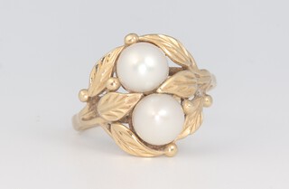 A yellow metal 14k cultured pearl set dress ring 6 grams, size R 